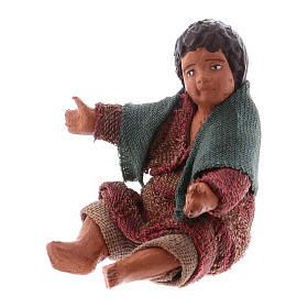Chłopczyk siedzący na ziemi 12 cm szopka neapolitańska