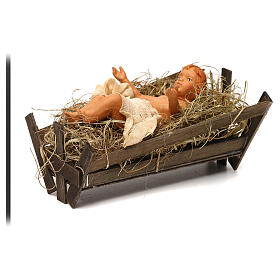 Dzieciątko Jezus w kołysce z drewna, do szopki neapolitańskiej 30 cm