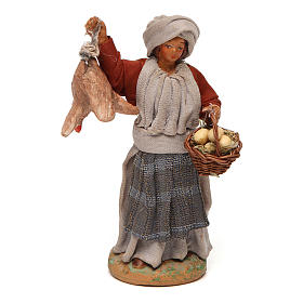Mulher com galinha na mão e cesta de ovos para presépio napolitano com peças de 12 cm de altura média