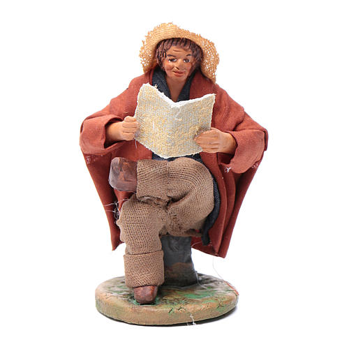 Uomo mentre legge 10 cm presepe di Napoli 1