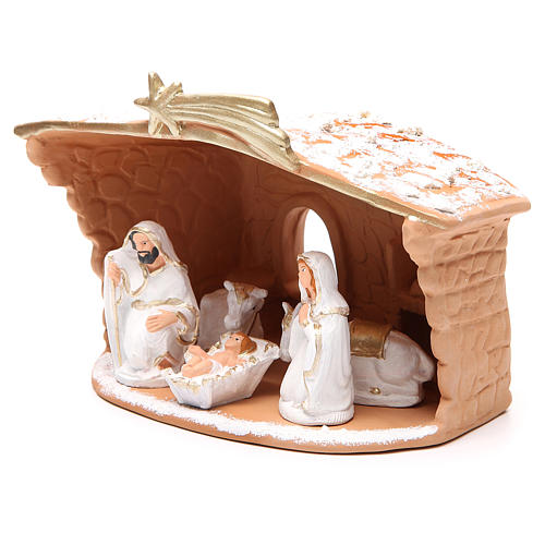 Nativity decorated terracotta with hut and snow h. 20x10x16cm 2