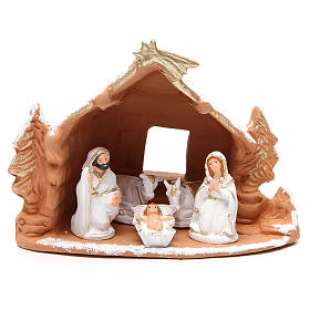 Nativity decorated terracotta with hut and snow h. 20x14x18cm