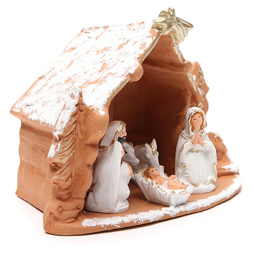 Nativity decorated terracotta with hut and snow h. 20x14x18cm 3