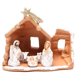 Nativity in painted terracotta and snow 15x16x9cm