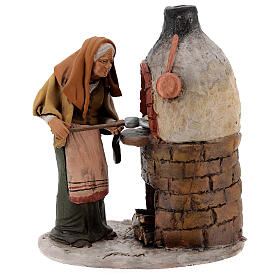 Mujer cerca del horno de terracota para belén Deruta 18 cm de altura media