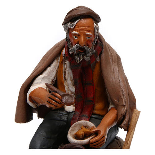 Rolnik siedzący z motyką do szopki, Deruta 30 cm, terakota 2