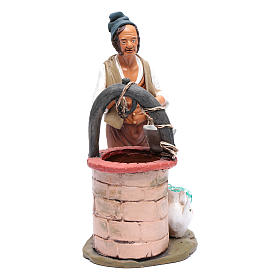 Man drawing water from a well 30cm terracotta Deruta