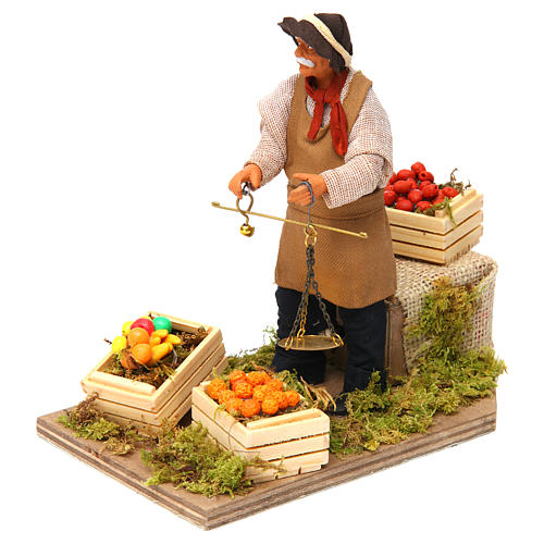 Animated Nativity scene figurine, greengrocer with scales 14 cm 2