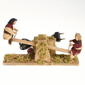 Presepe Napoletano: Bimbi su dondolo 14 cm movimento terracotta