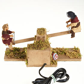 Presepe Napoletano: Bimbi su dondolo 14 cm movimento terracotta