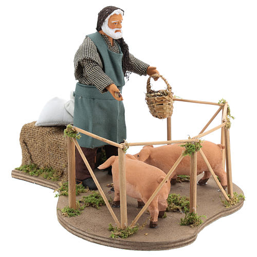 Animated Nativity scene figurine, man feeding pigs 14cm 4