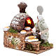 Animated nativity scene figurine, 8 cm baker with 2 LED s2