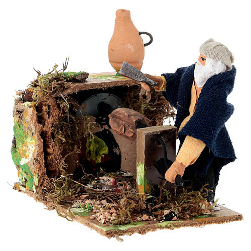 Homme au gril animé pour crèche 8 cm 2