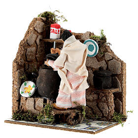 Femme qui cuisine en mouvement crèche 8 cm