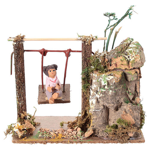 Child on swing, animated nativity figurine 10cm 1