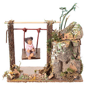 Child on swing, animated nativity figurine 10cm