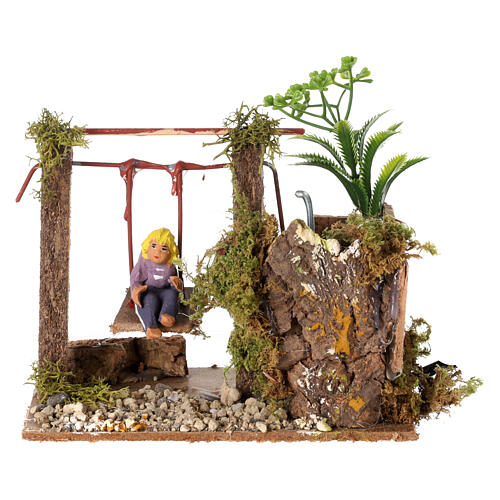 Child on swing, animated nativity figurine 10cm 1