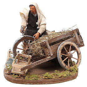 Man fixing wheel with cart, animated Neapolitan Nativity figurine 12cm