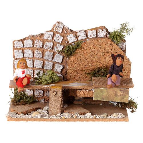 Boy and girl on seesaw measuring 7cm, animated nativity figurine 1