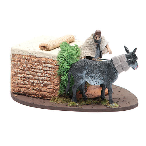 Man with moving donkey for nativity scene PVC 10 cm 3