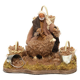 Man shearing sheep for Neapolitan Nativity scene 12 cm, moving statue