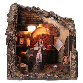 Presepe Napoletano: Ambientazione movimento donna mentre spazza in casa presepe Napoli