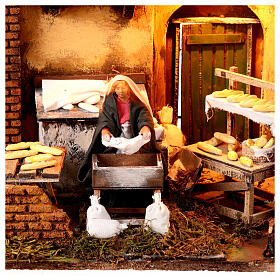 Animated Woman Kneading Bread Nativity 12 cm