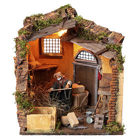 Moving scene with farmer in stable for Neapolitan nativity scene