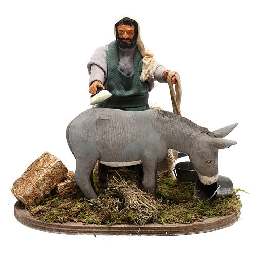 Man currying donkey  in movement 14 cm for Neapolitan nativity scene 1