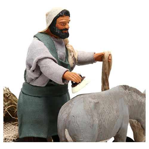 Man currying donkey  in movement 14 cm for Neapolitan nativity scene 2
