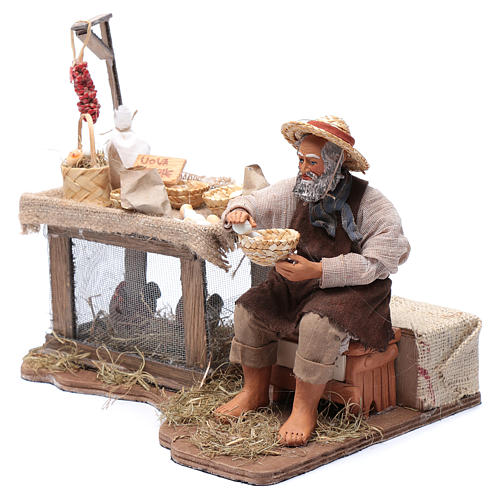 Venditore di uova seduto movimento 30 cm presepe napoletano 2