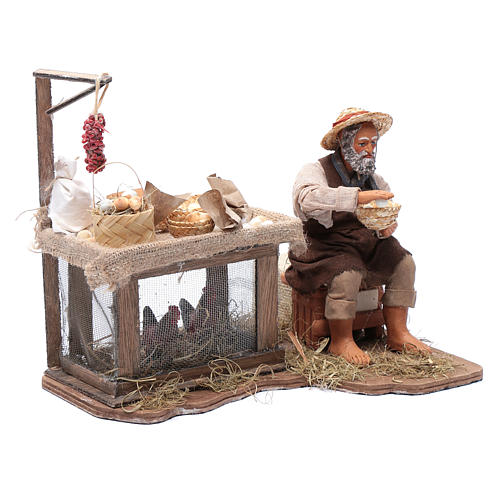 Venditore di uova seduto movimento 30 cm presepe napoletano 3