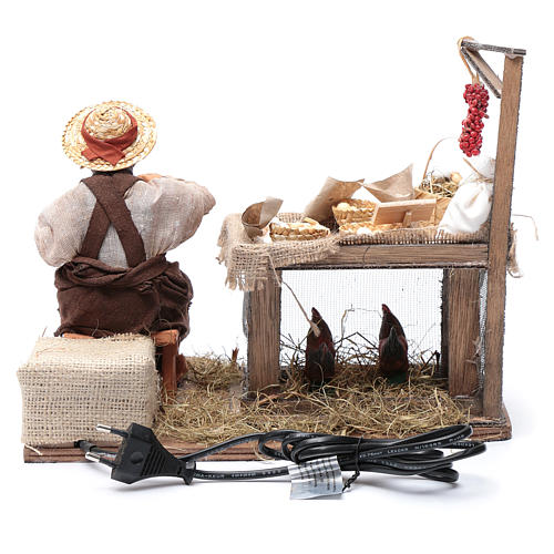 Venditore di uova seduto movimento 30 cm presepe napoletano 4