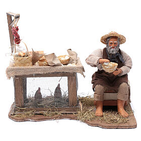 Sprzedawca jajek, siedzący, ruchoma figurka, szopka neapolitańska 24 cm