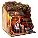 Moving nativity scene wine seller 10 cm with light and barrel s3
