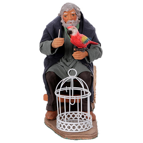 Neapolitan nativity scene moving man with parrot in cage 24 cm 1