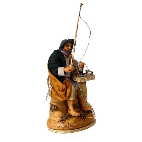 Neapolitan nativity scene moving fisherman on a rock 30 cm 4