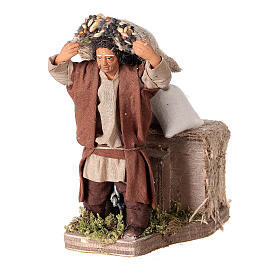 Moving shepherd with bags of seeds for Neapolitan Nativity Scene 10 cm