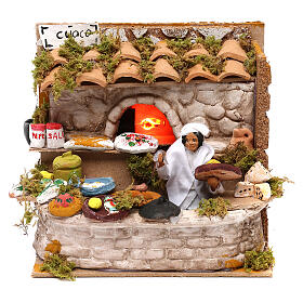 Animated chef scene with oven lights 12 cm nativity scene