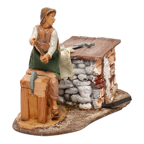 Knife grinder with movement in resin, for 12 cm nativity 2