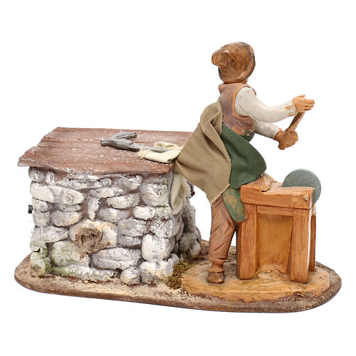 Knife grinder with movement in resin, for 12 cm nativity 3