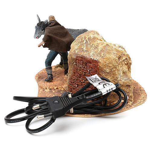 Hombre y burro Oliver con movimiento para belén 10 cm 4
