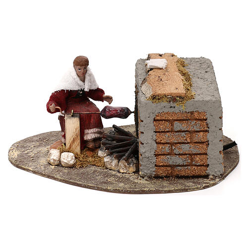 Animated woman with rotisserie Oliver for 10 cm Nativity Scene 1