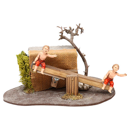 Children on seesaw Oliver with movement, for 10 cm nativity 1