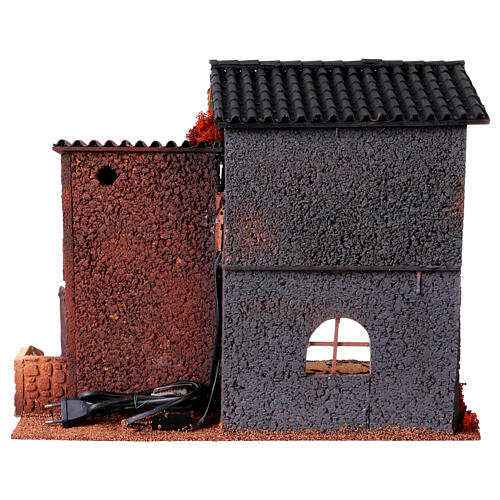 Maison avec femme qui ouvre la fenêtre 45x50x30 cm mouvement crèche 12 cm 8