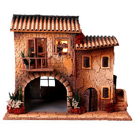 Casa con donna che apre finestra 45x50x30 cm movimento presepe 12 cm