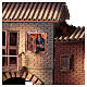 Casa con donna che apre finestra 45x50x30 cm movimento presepe 12 cm s2