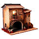 Casa con donna che apre finestra 45x50x30 cm movimento presepe 12 cm s5