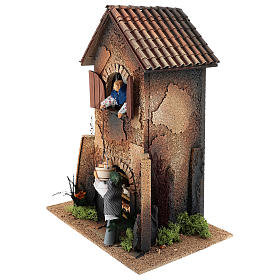 Casa mulher que desce um cesto da janela 40x30x20 cm movimento para presépio com figuras de 12 cm de altura média