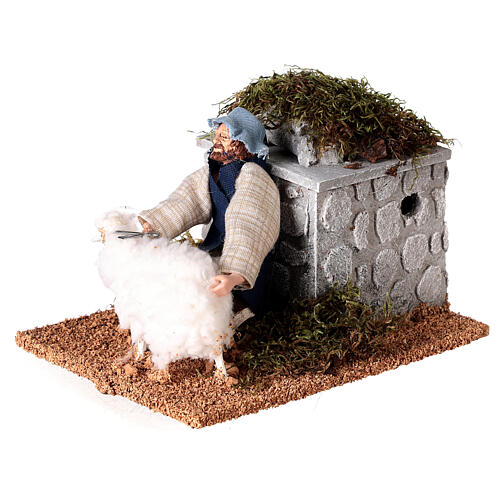 Sheep shearer in movement of 10x15x10 cm, 12 cm nativity 2